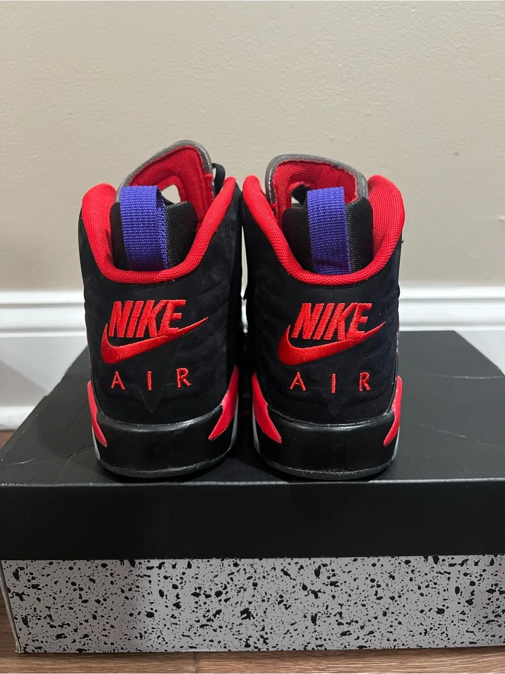 Kids Jordan Sneakers Black with Red and Purple Accents